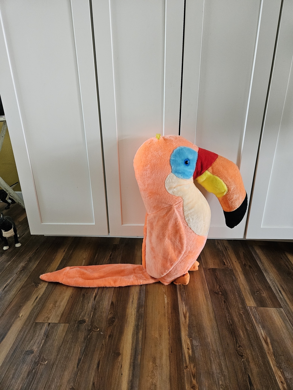 ACME Plush Toy Tag on Coral-Orange Fabric with Multicolor Logo